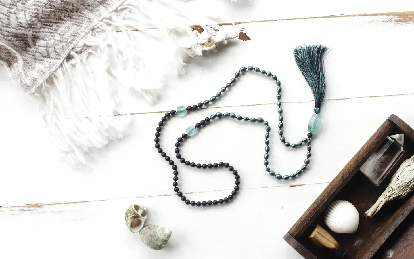 A pair of beaded anklets